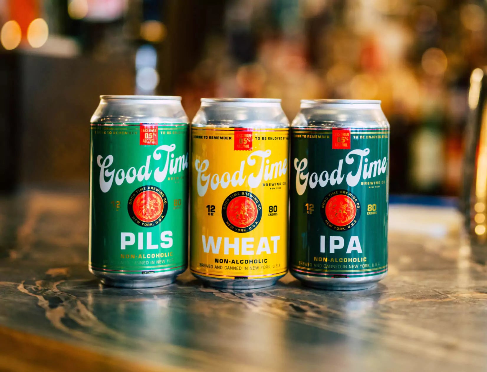 Good Time Brewing's Pils, Wheat, and IPA side by side on a table top.